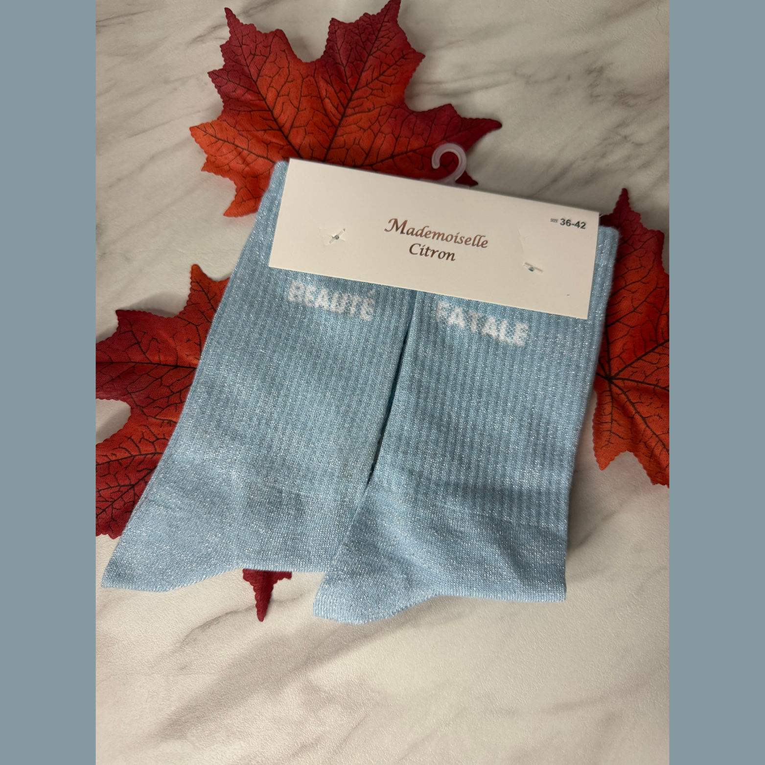 chaussettes à message « Beauté Fatale » Bleu ciel